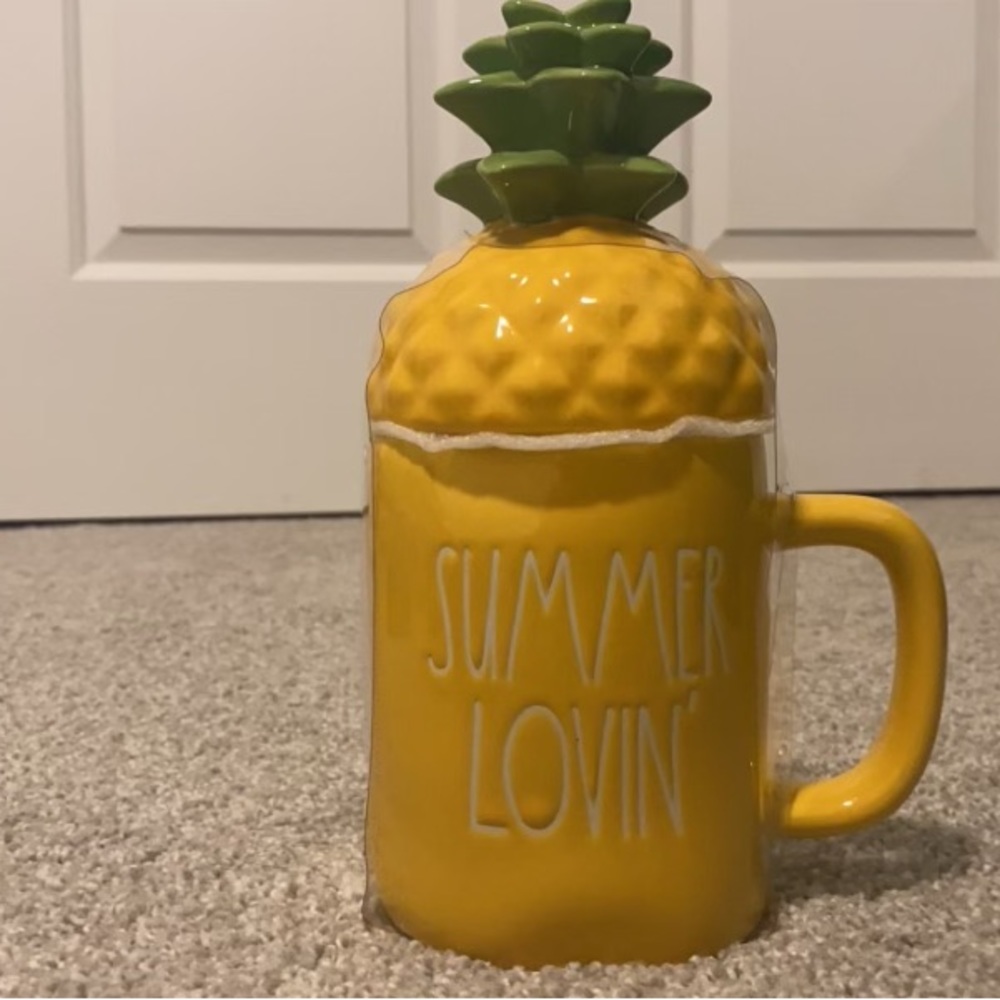 Rae Dunn mug with topper